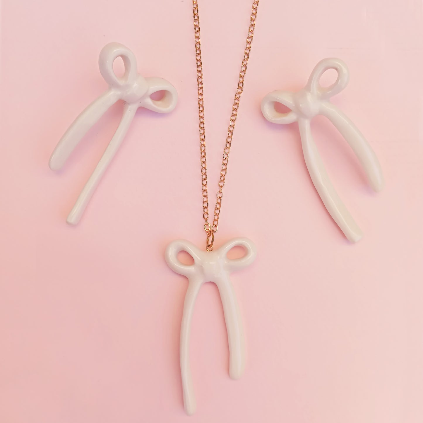OVERSIZED BOW EARRINGS