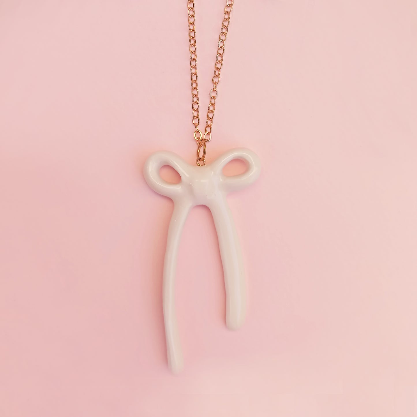 OVERSIZED BOW NECKLACE