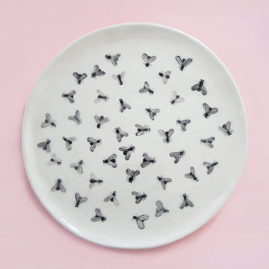 PLATE OF FLIES